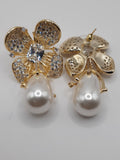 Gold- toned hypoallergenic shell pearl flower stud cubic zirconia earrings