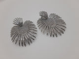 Silver Sunburst female statement dangle earrings